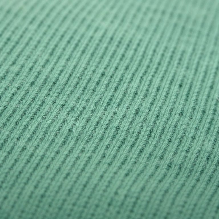 zoom sur le tissu vert en coton Oeko-Tex utilisé sur les produits Naturaciel